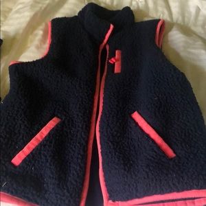 Girls navy fleece vest with pink trim